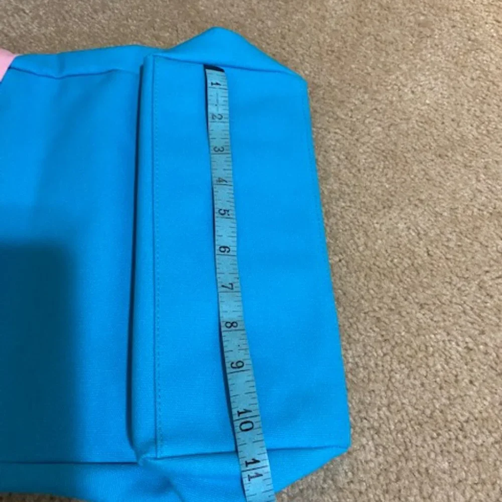 Cute bag. Blue with pink ribbon. Ralph tag. 12